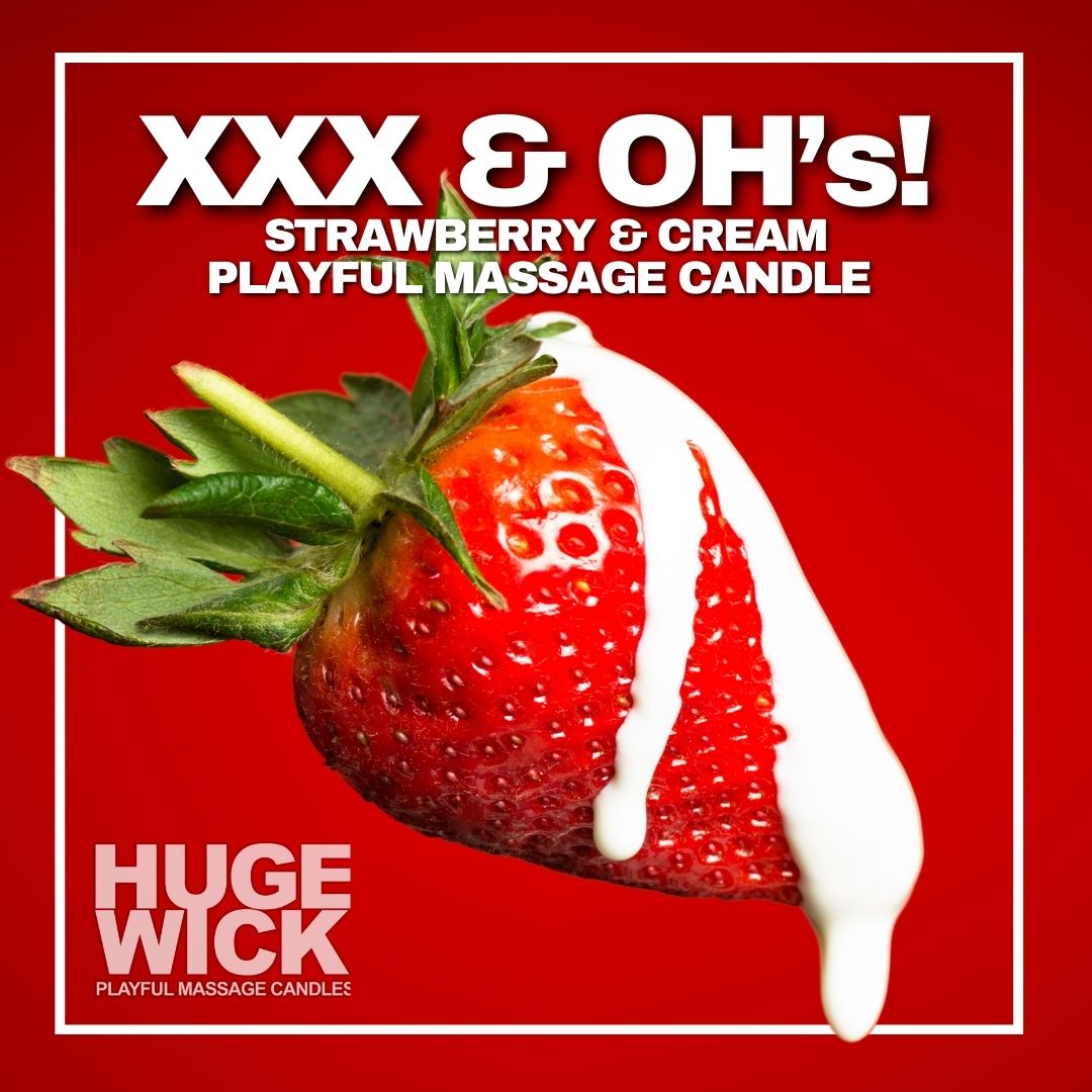 XXX & Oh's strawberries and cream massage candle with a ripe strawberry